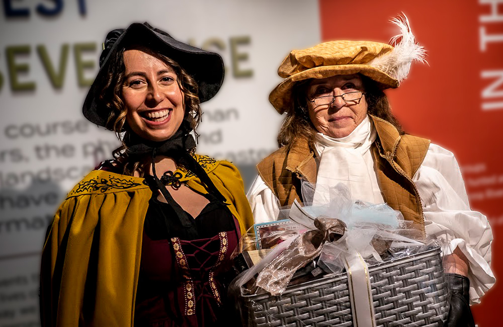 Two women in period attire at a WITF event